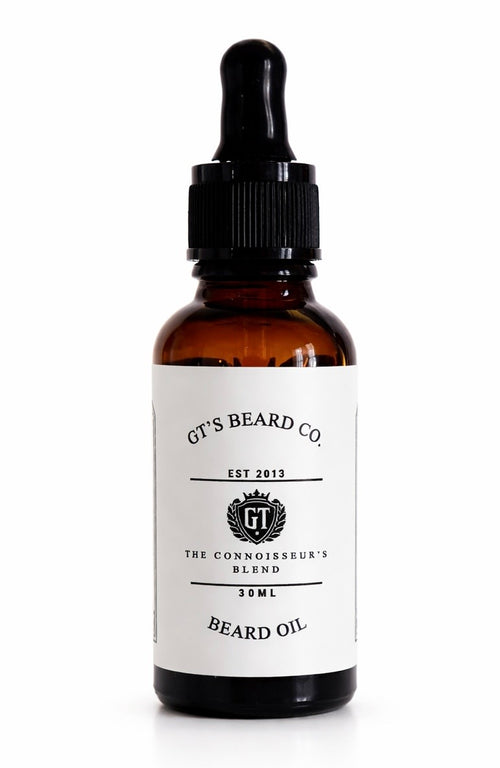 Bottle of GT's Beard Co. beard oil with a dropper on a white background